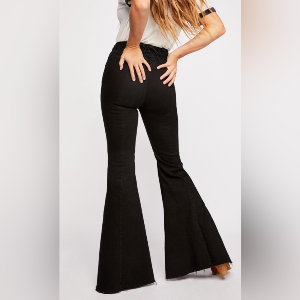 Free people CRVY fit bell bottom jeans with lacing up the back